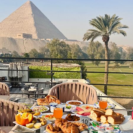 ホテル New Golf Pyramids View Kafret el-Gabal エクステリア 写真