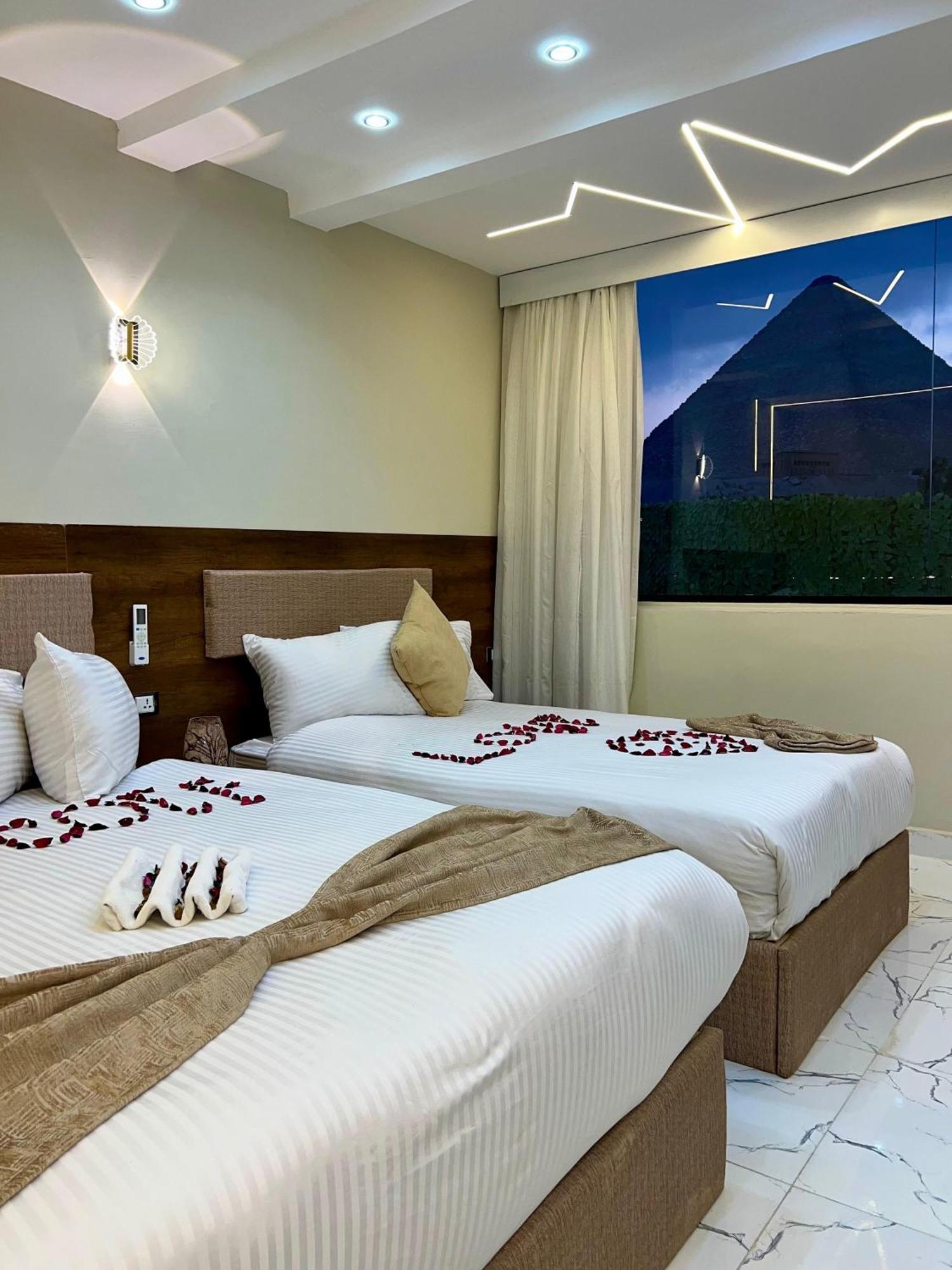 ホテル New Golf Pyramids View Kafret el-Gabal エクステリア 写真